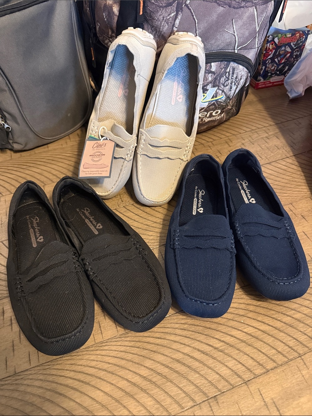 Skechers women’s  Slip-On Loafers — Black, Navy, Cream 3 pairs Do not fit